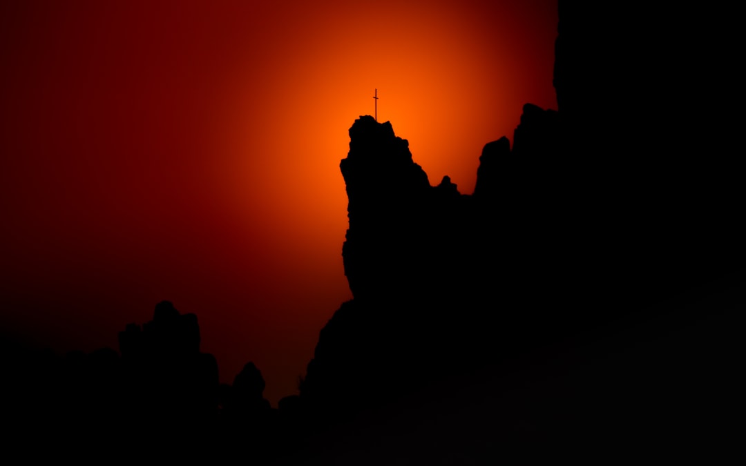 silhouette of mountain during sunset