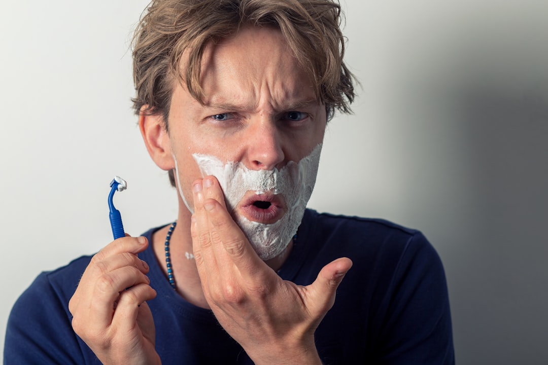 Man cuts himself shaving