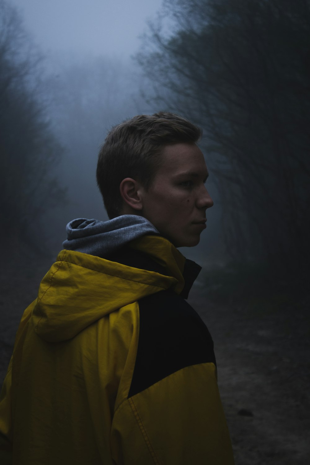 man in yellow and black jacket