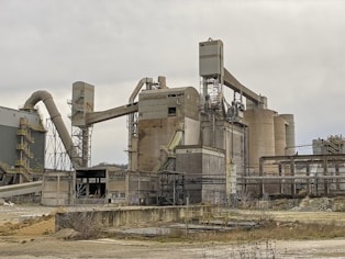 gray concrete building under white sky during daytime