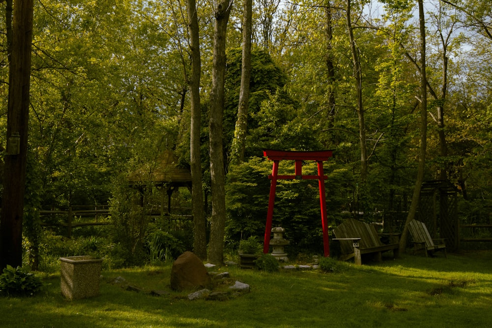 brown wooden stand near green trees during daytime