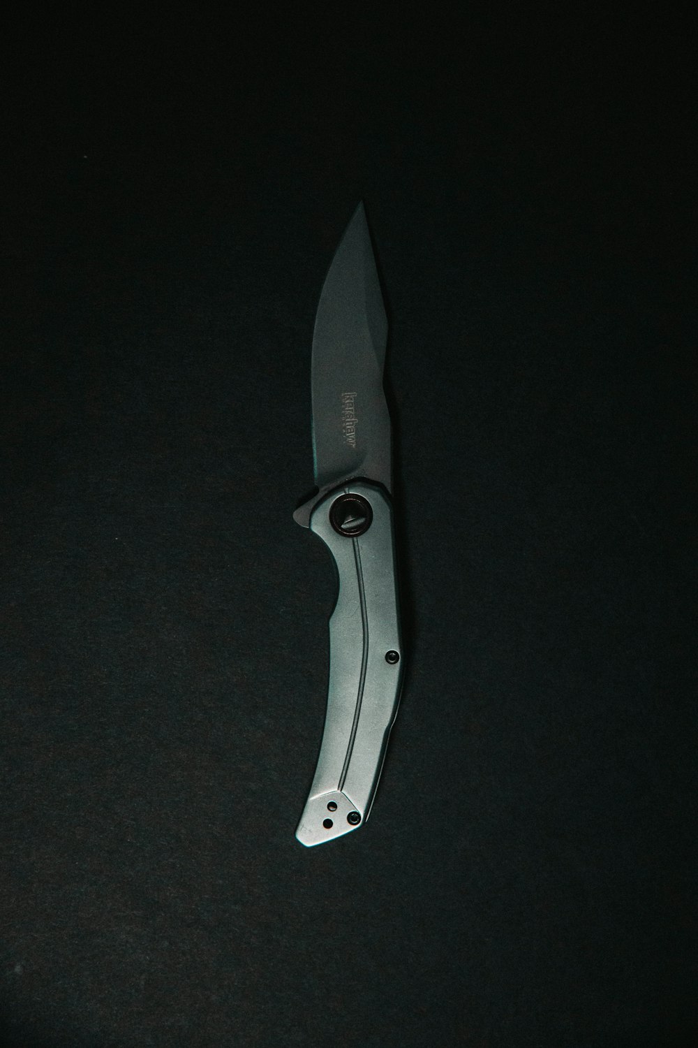 black and silver folding knife