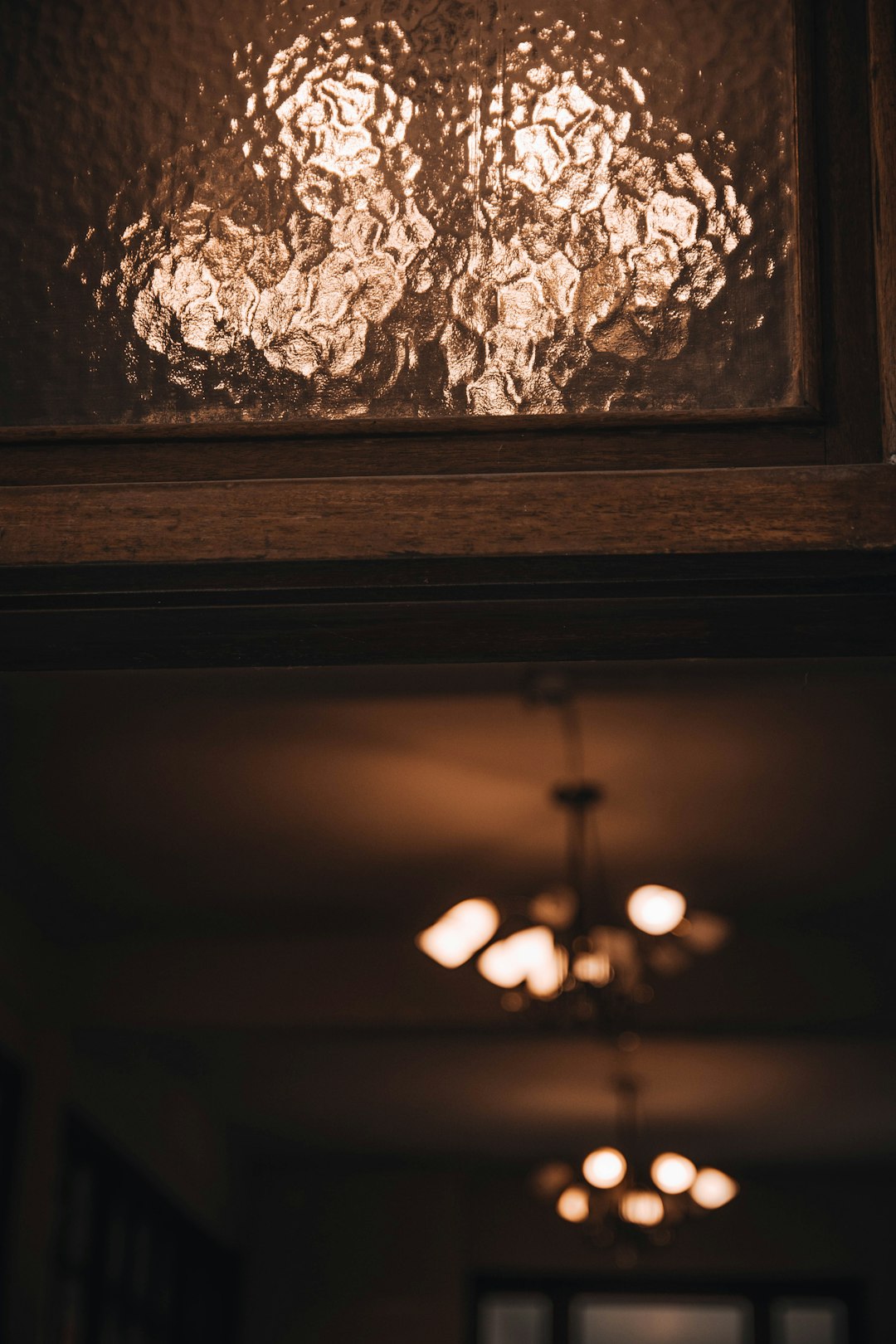 brown wooden frame with light bulb