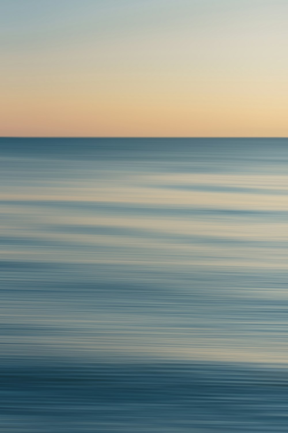 blue and white ocean water during daytime