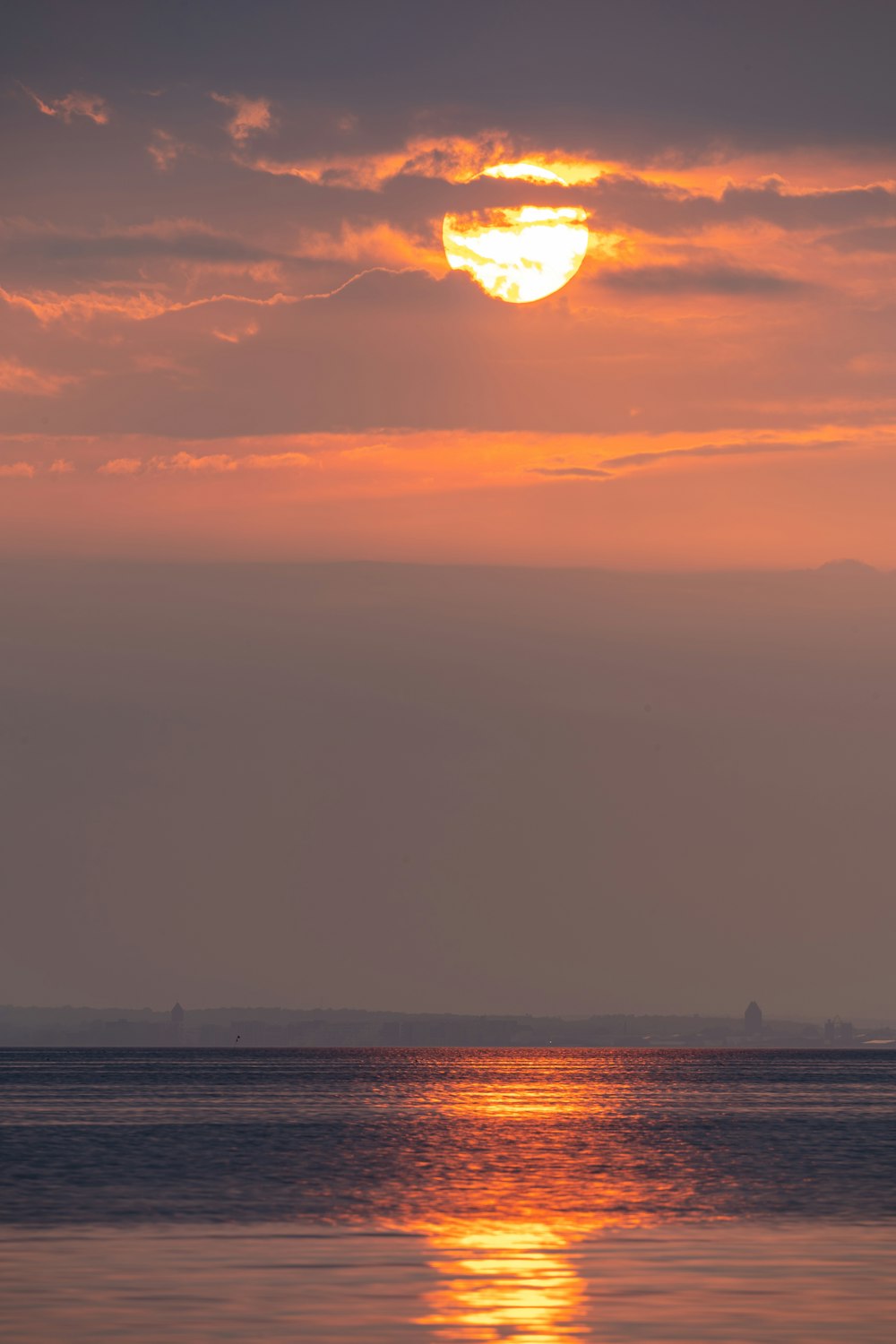 body of water during sunset