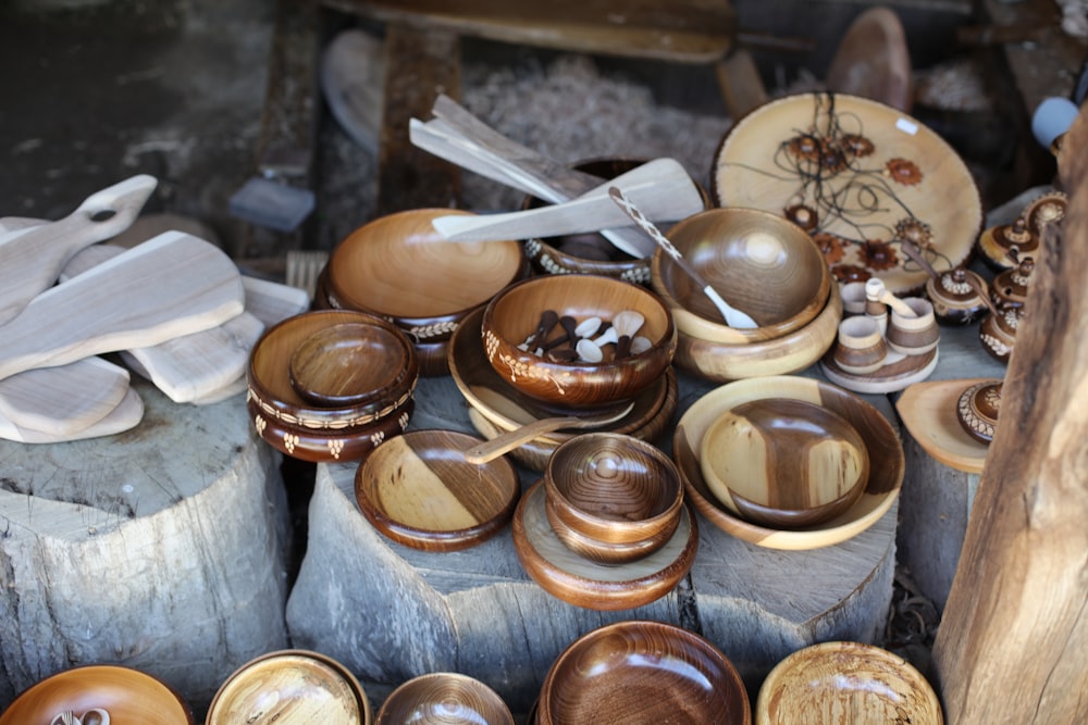 brown wooden round container on gray wooden table