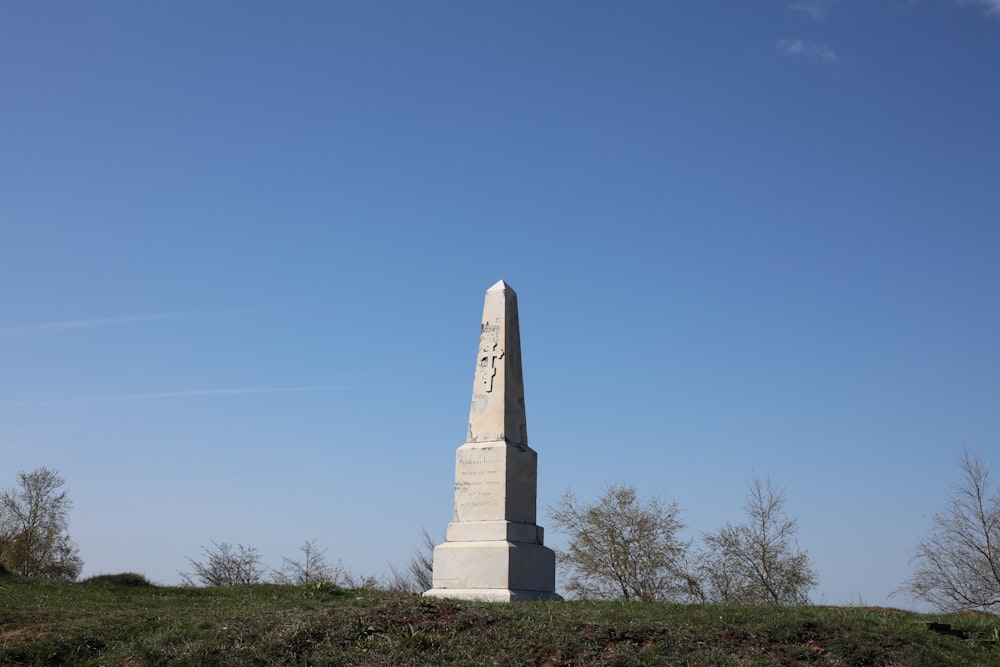 white monument under blue sky during daytime