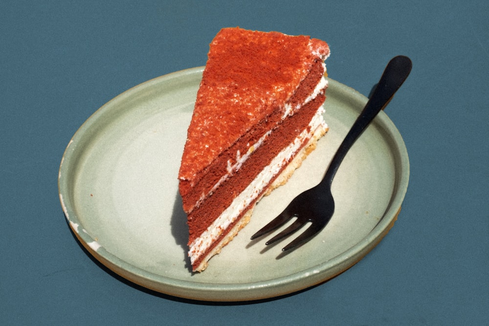 sliced cake on white ceramic plate