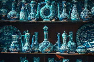 Colorful pottery pieces shaped by hand, reflecting traditional Emirati designs.