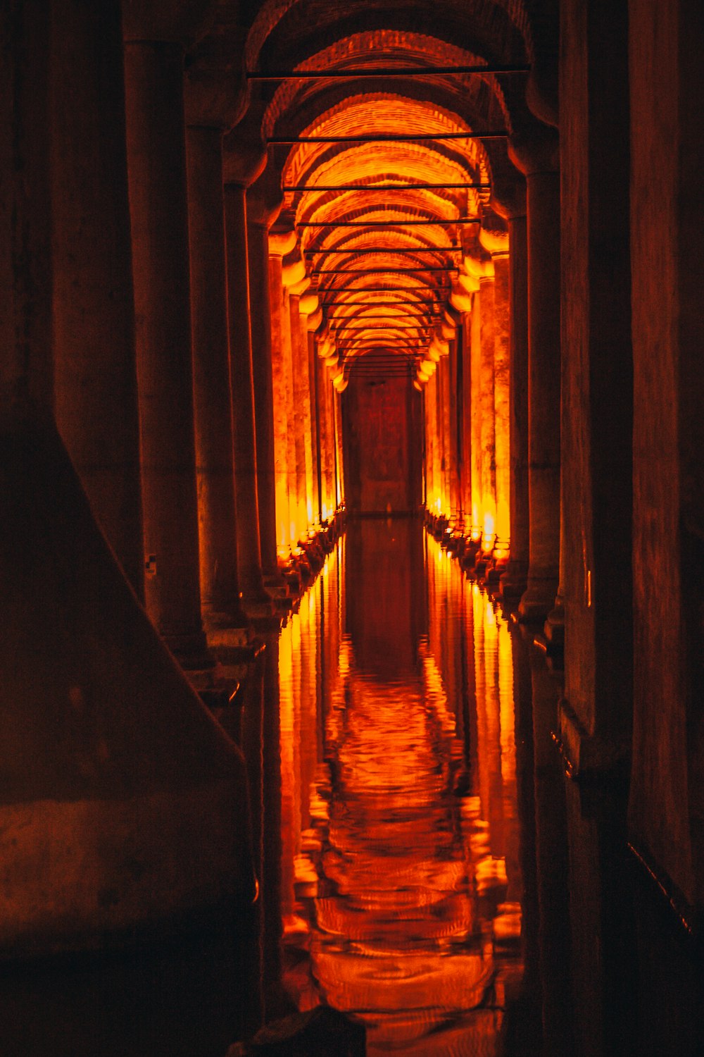 brown wooden hallway with light