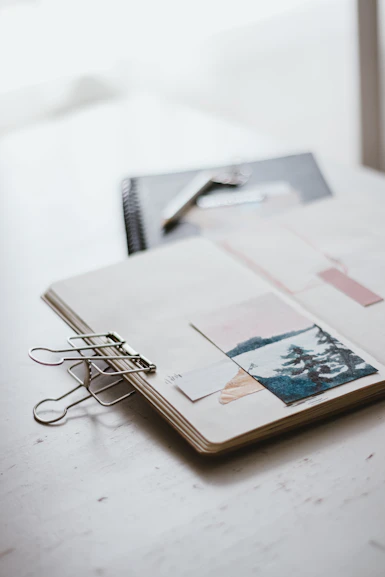 white printer paper with black framed eyeglasses