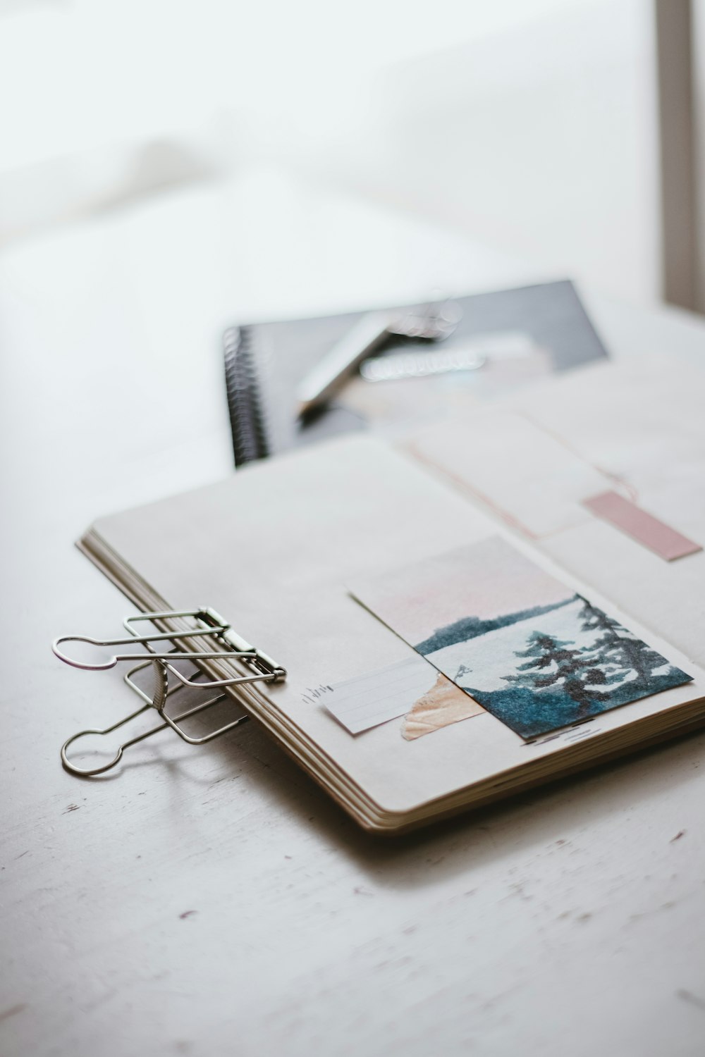 white printer paper with black framed eyeglasses