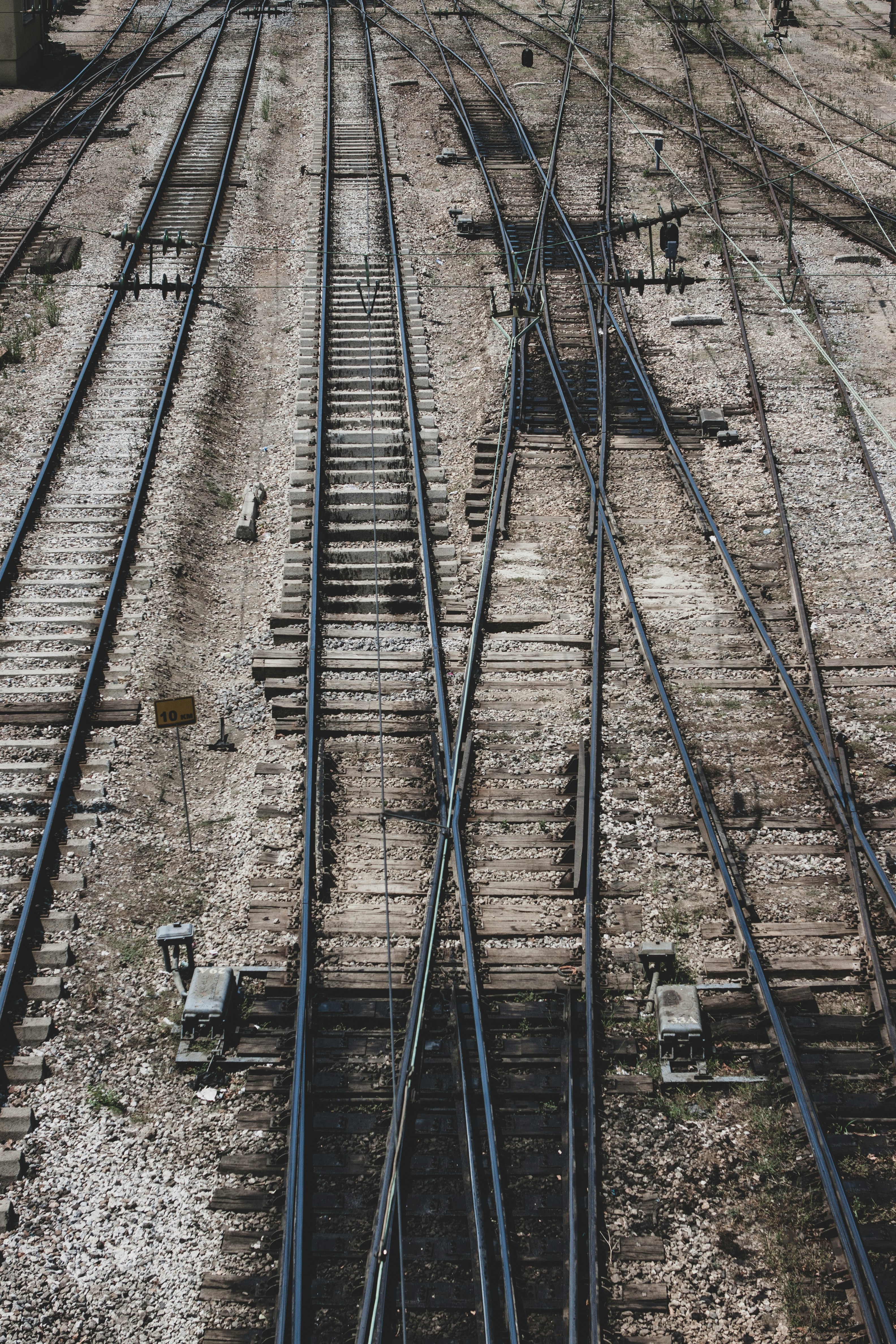 black metal train rail tracks