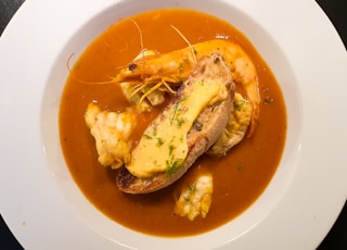 cooked food on brown ceramic plate