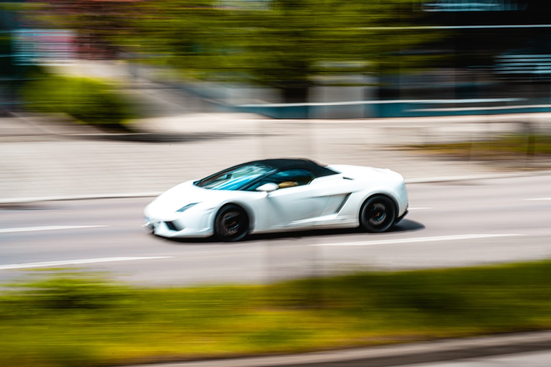 white porsche 911 on road