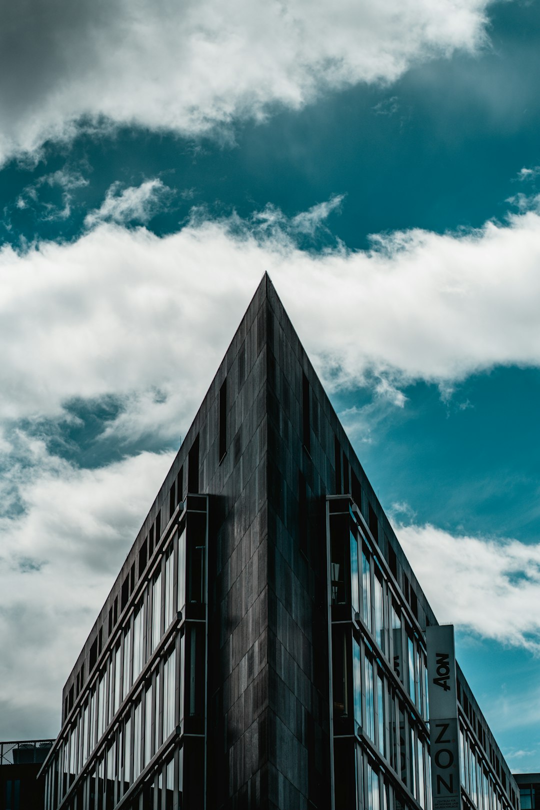 black concrete building under blue sky