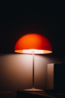 orange and black floor lamp