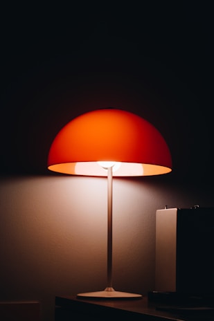 orange and black floor lamp
