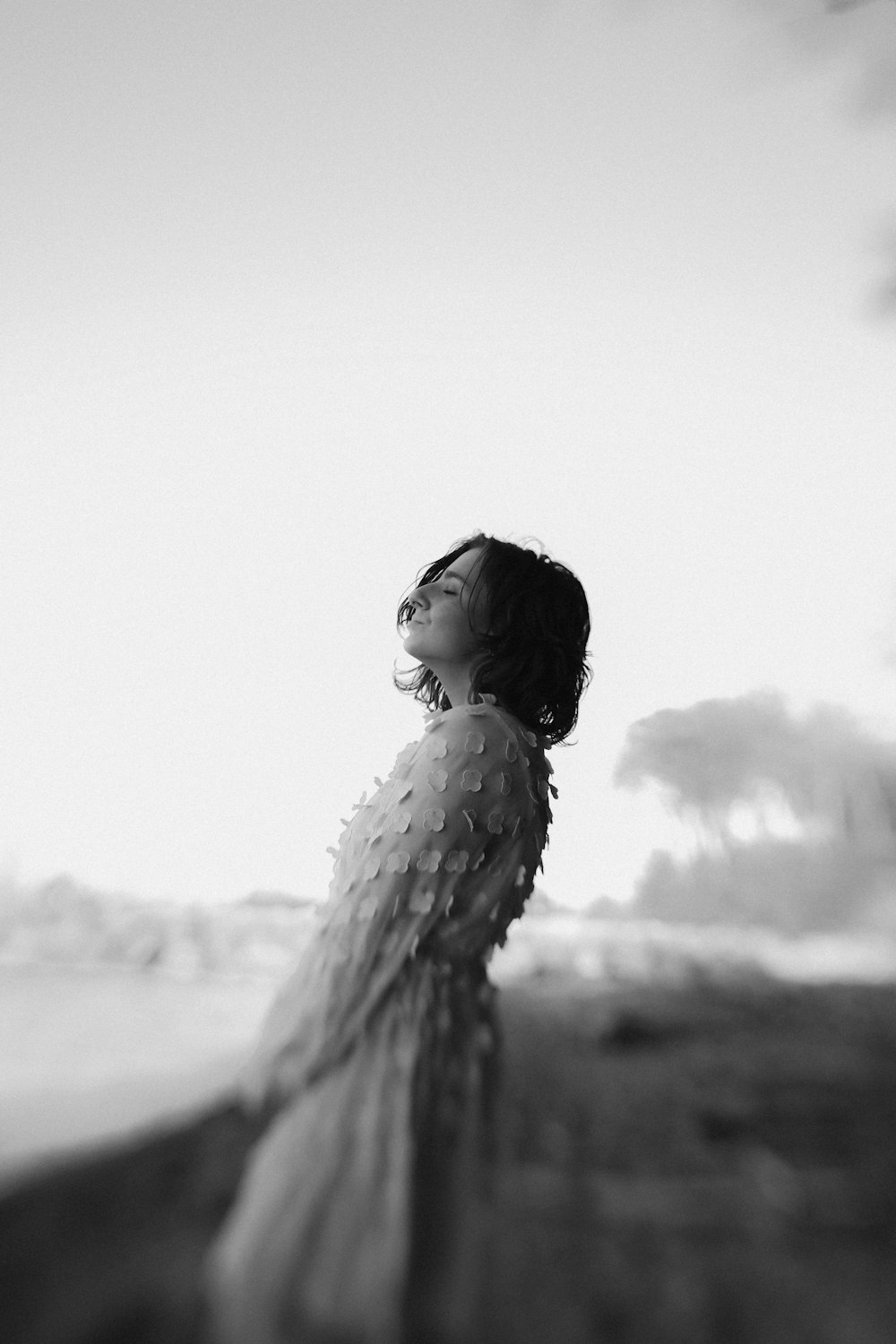 grayscale photo of girl in dress