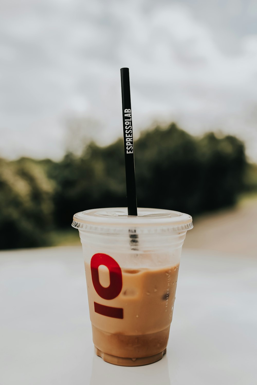 dunkin donuts disposable cup with black straw