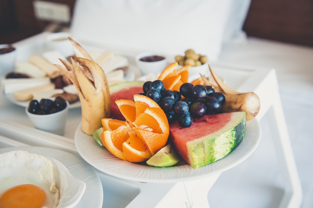 fruits on white ceramic plate