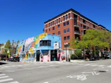 Colorful murals brightening a lively street corner in Schaumburg.