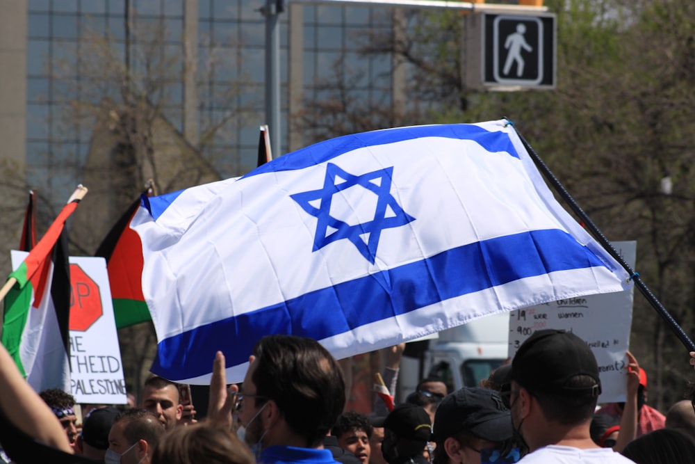 people gathering on street during daytime