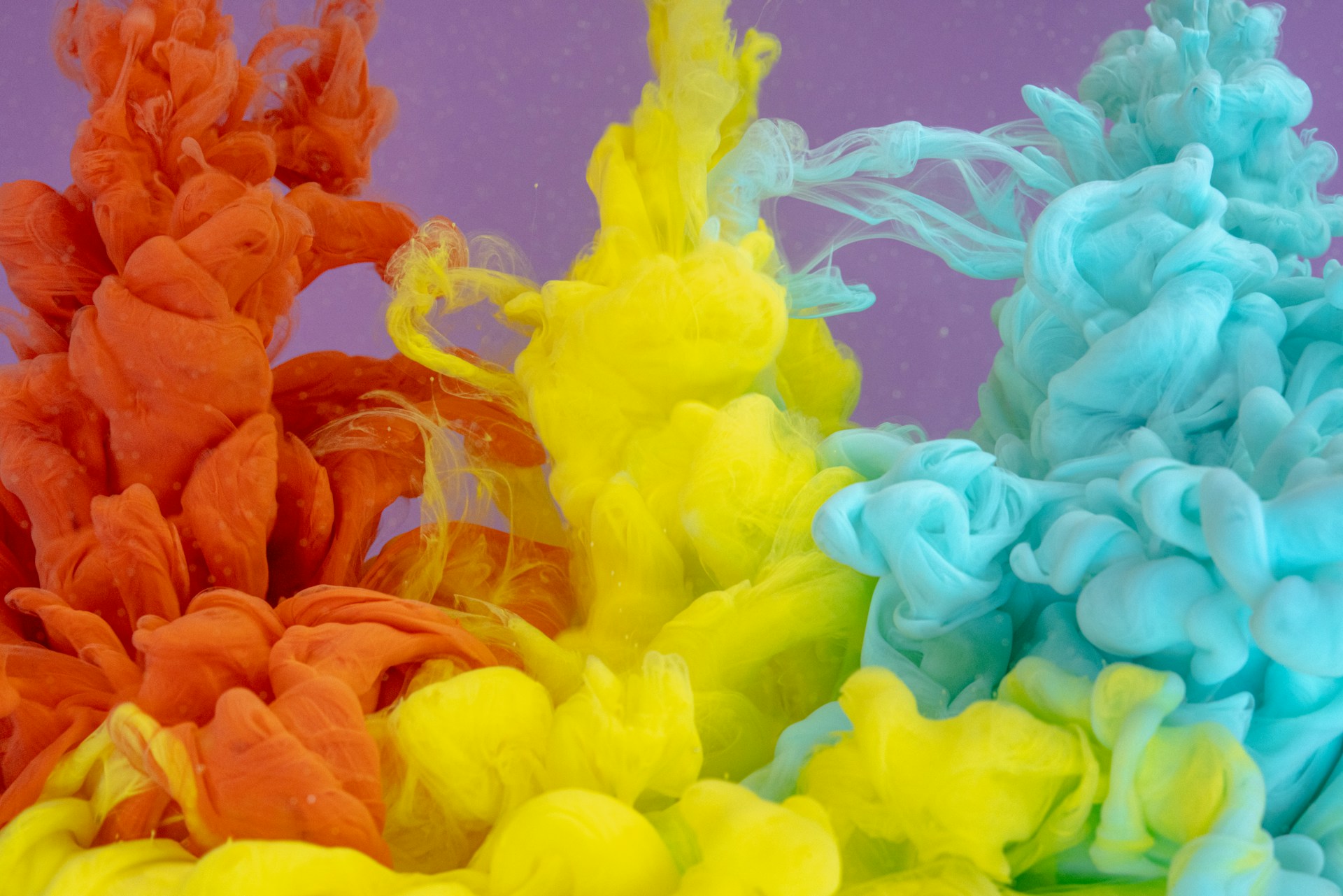 pink yellow and blue smoke