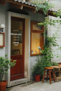 An inviting view of the café's entrance with rustic decor.