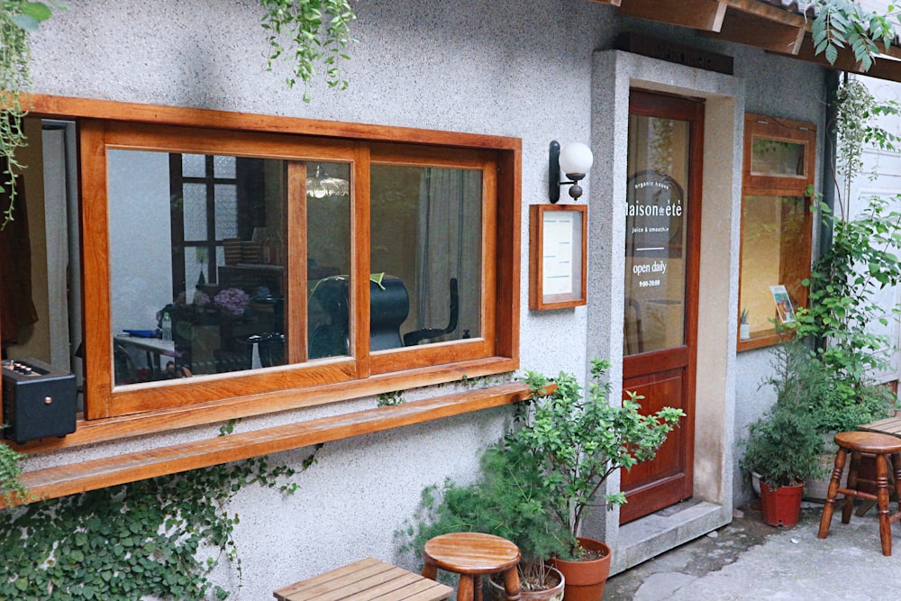 brown wooden framed glass window