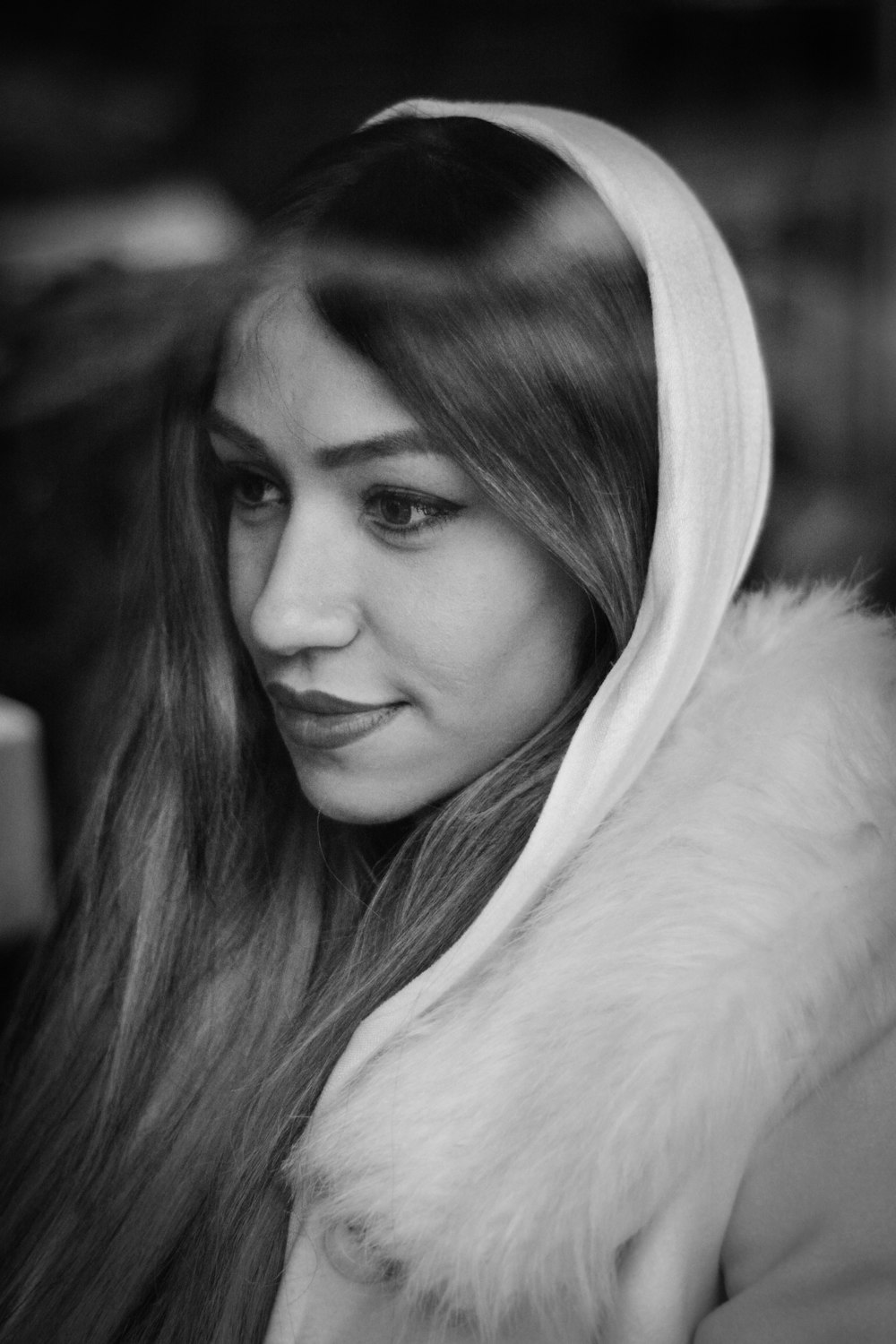 woman in white fur hoodie