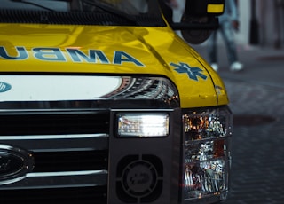 yellow and white ford van