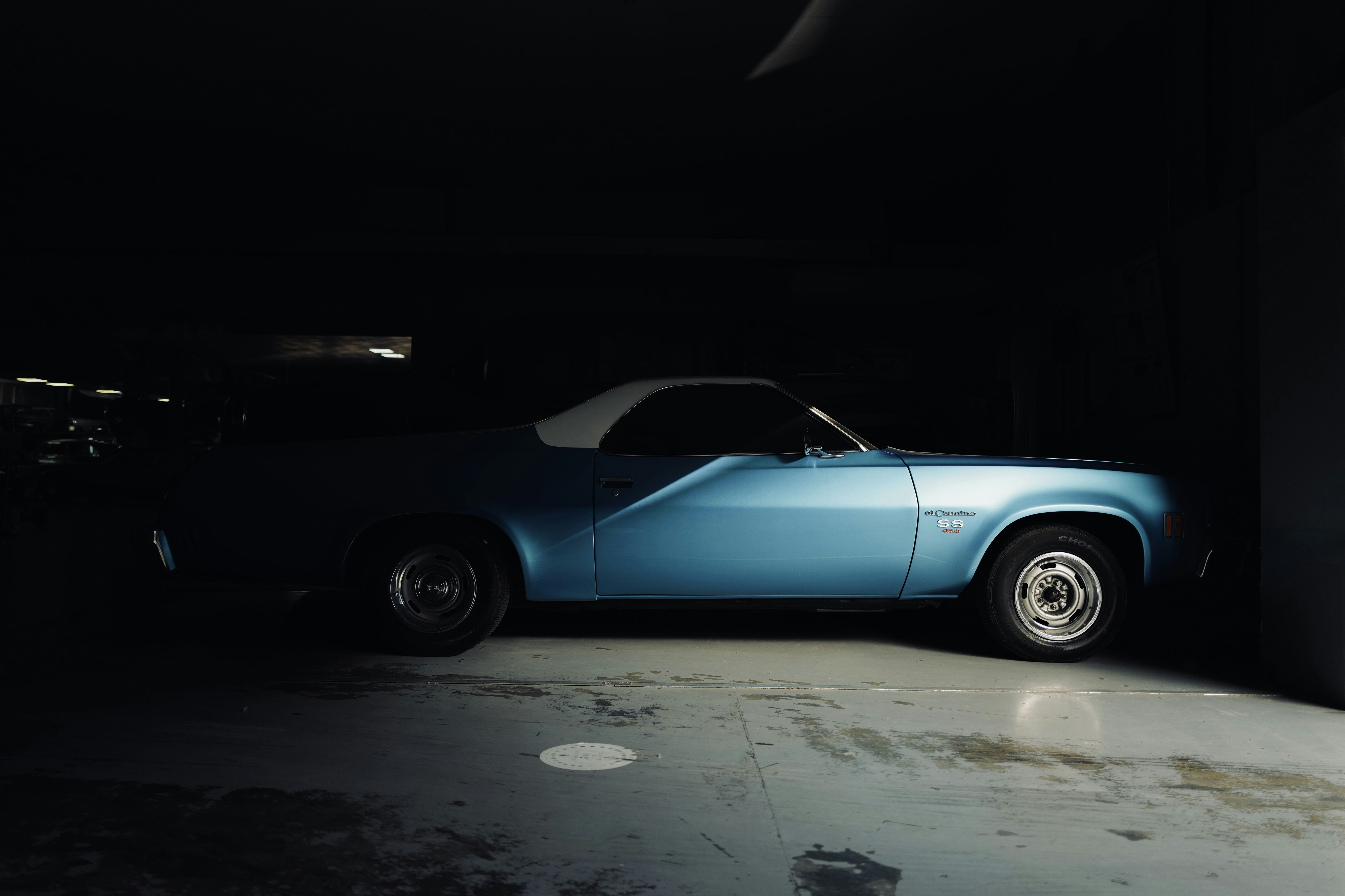 blue and white convertible coupe