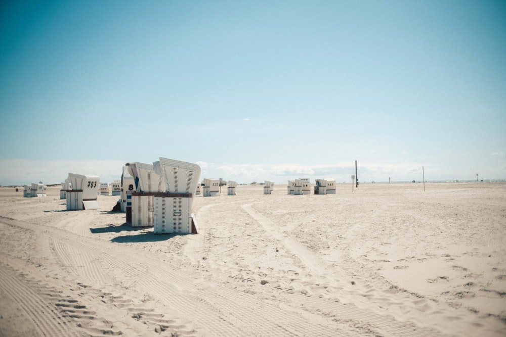 white concrete building on desert during daytime