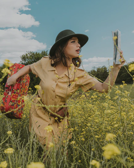 A vibrant image of a traveler smiling with a suitcase near a blooming garden, symbolizing growth and travel joy.