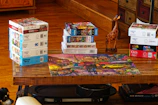 Brightly colored Bible-themed puzzles and games on a table