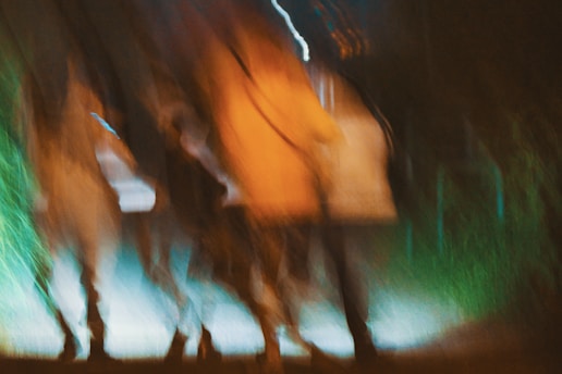 person in black pants standing