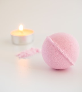 pink and white round candle