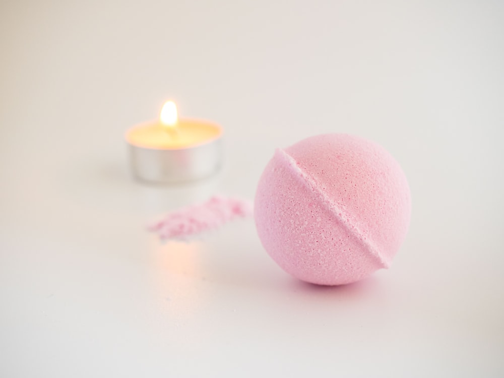pink and white round candle