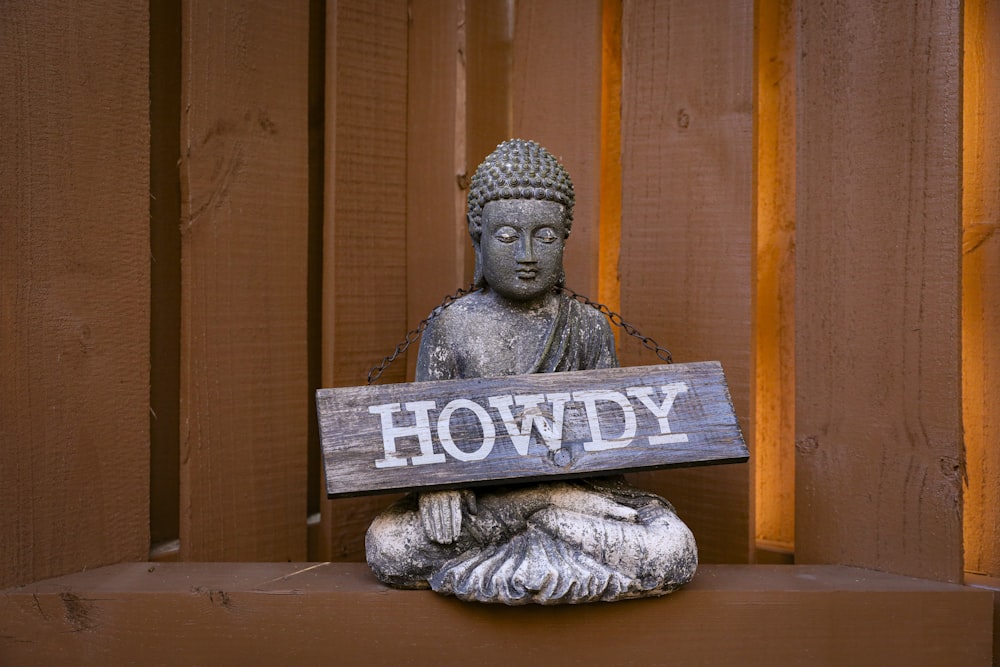 gray and white concrete buddha figurine