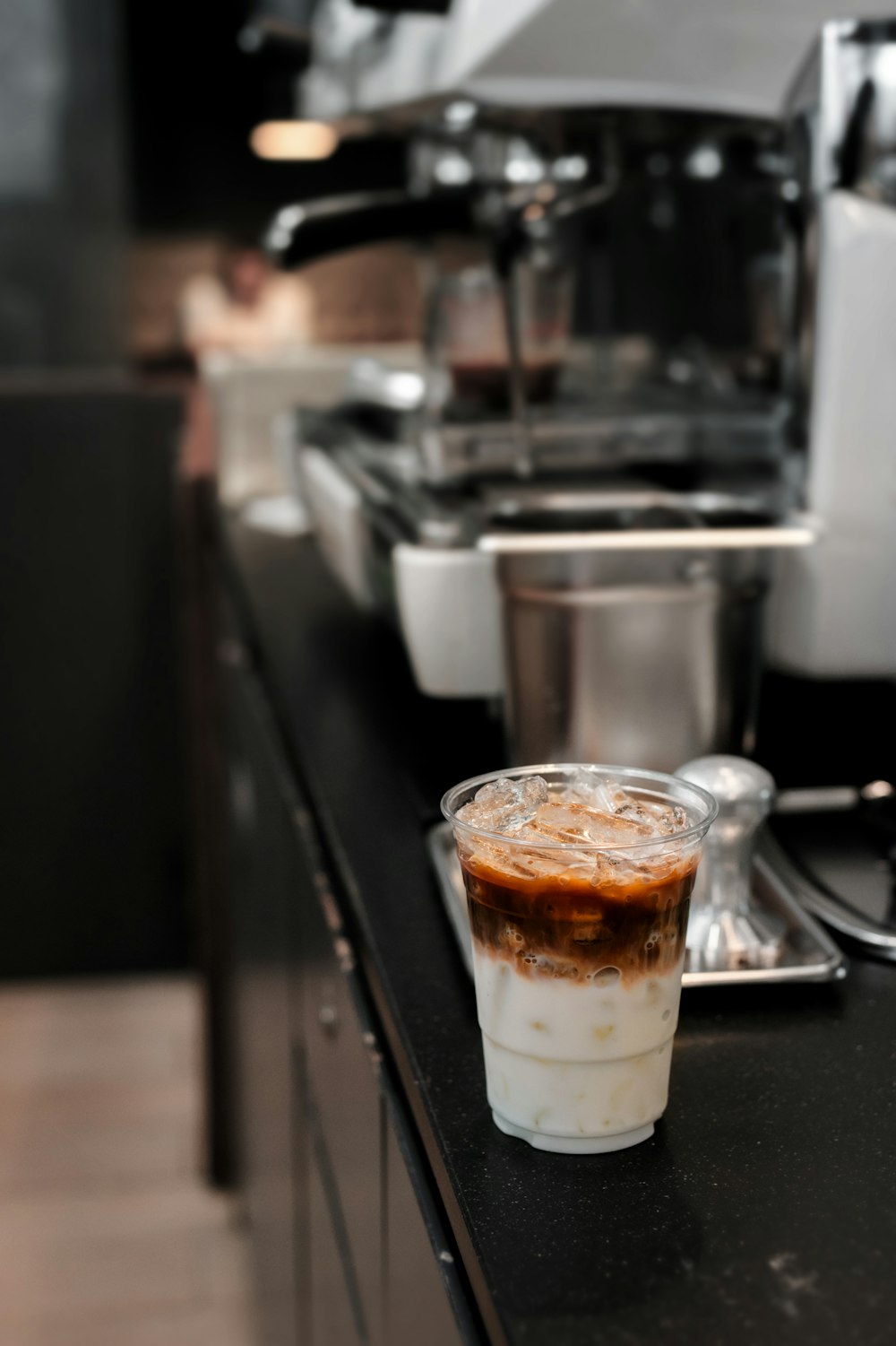 clear drinking glass with brown liquid