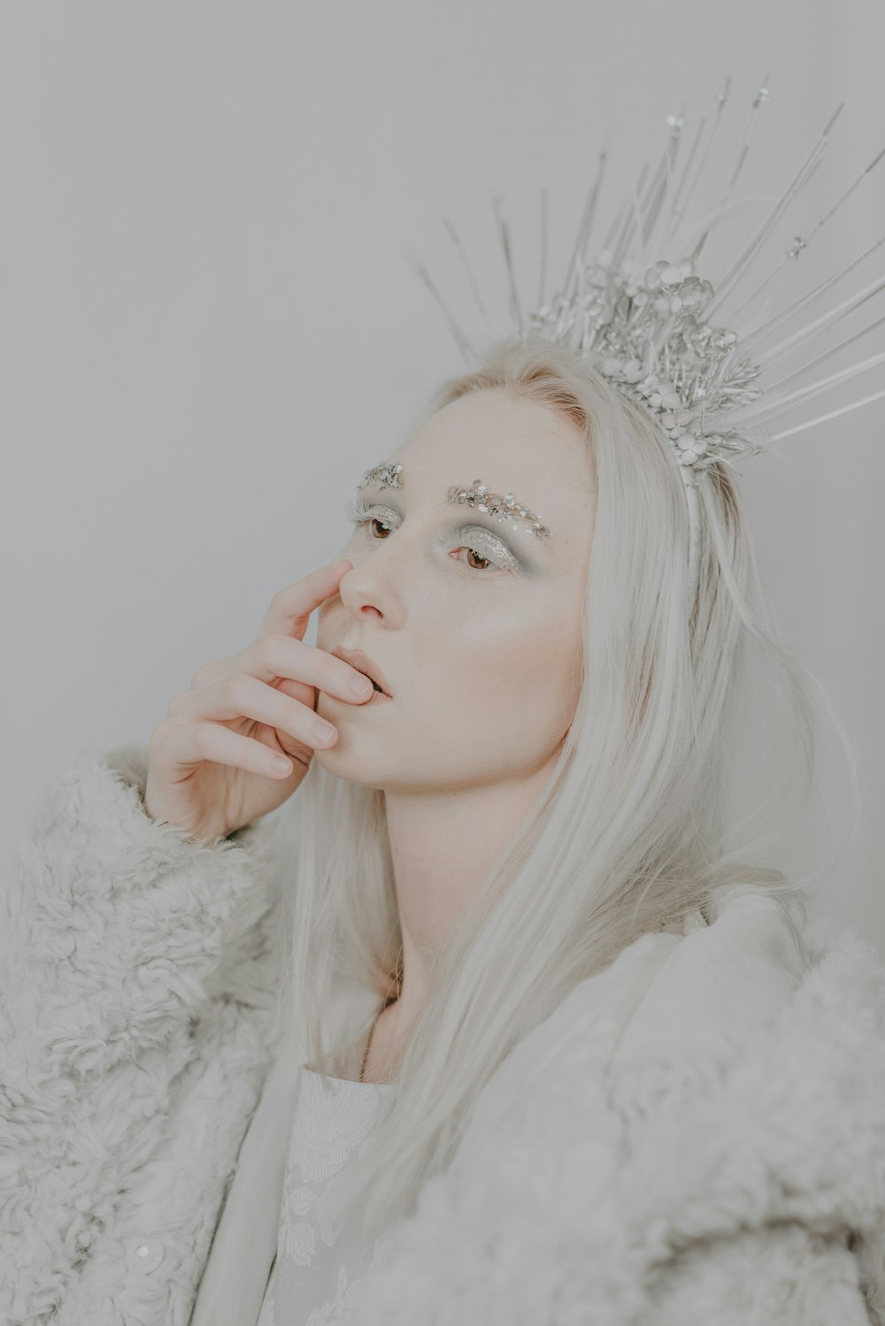 woman in white fur coat