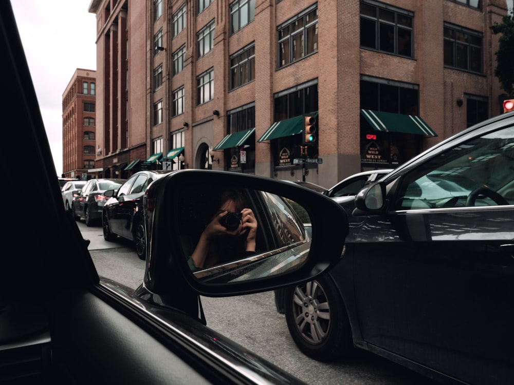 cars parked on side of the road during daytime