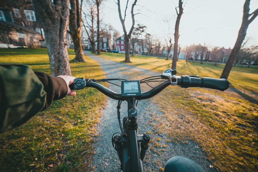 ebike riding in a park on gravel