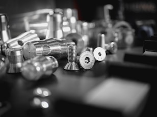 silver steel tools on black table