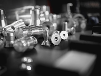 silver steel tools on black table