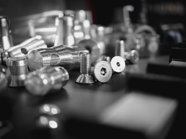 silver steel tools on black table