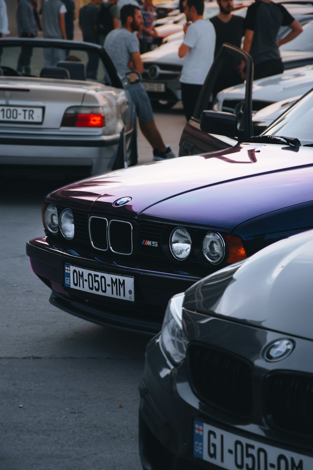 white bmw m 3 on road during daytime