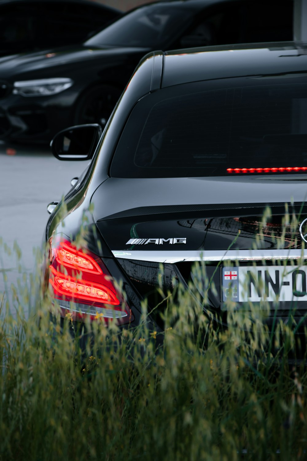 black car on road during daytime