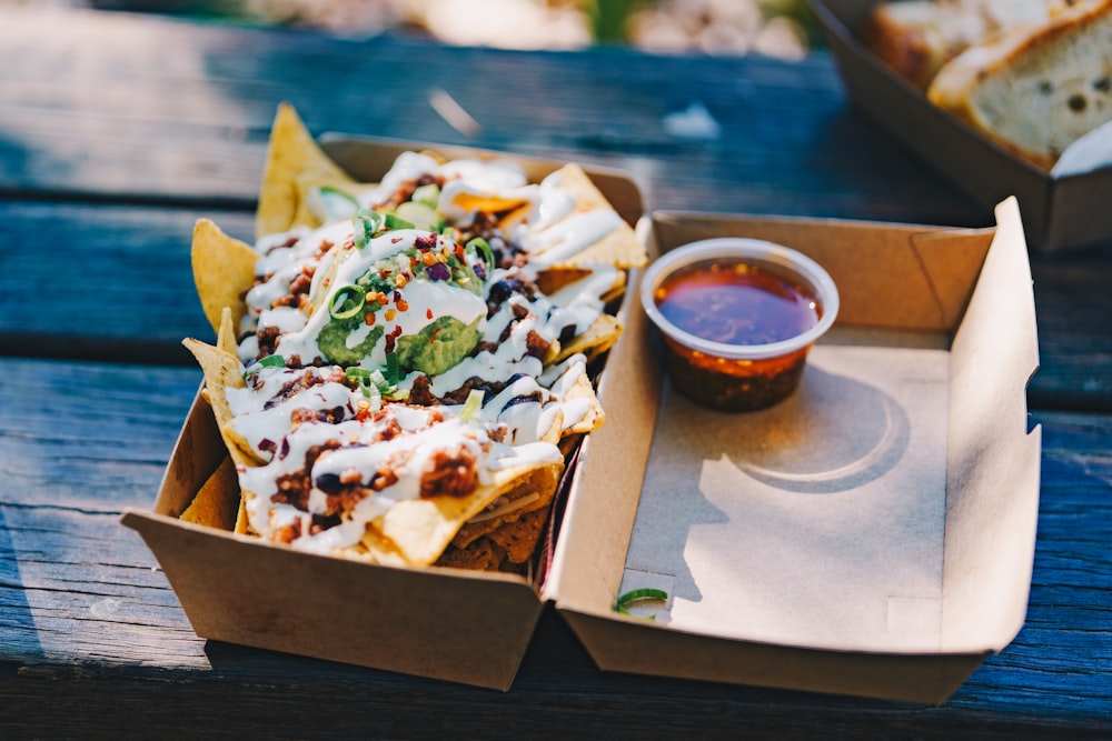 brown and green food on brown carton box